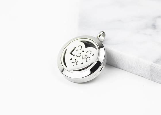 China 25MM Openwork Heart Essential Oil Jewelry Stainless Steel Aromatherapy Locket Pendant supplier